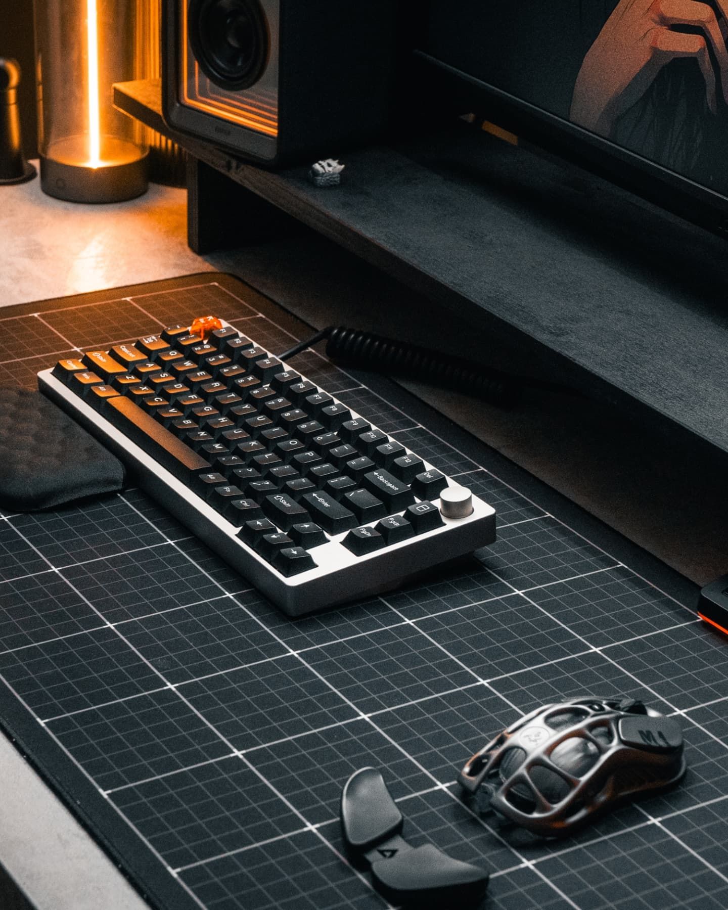 Overhead view of minimalist mechanical keyboard, mouse, and gaming setup